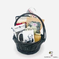 tea leaf gift basket with a mug and snags